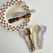 Decorative Dessert Spoon & Knife. 
Tortoise shell style acrylic plastic tablewear set - 2 piece.