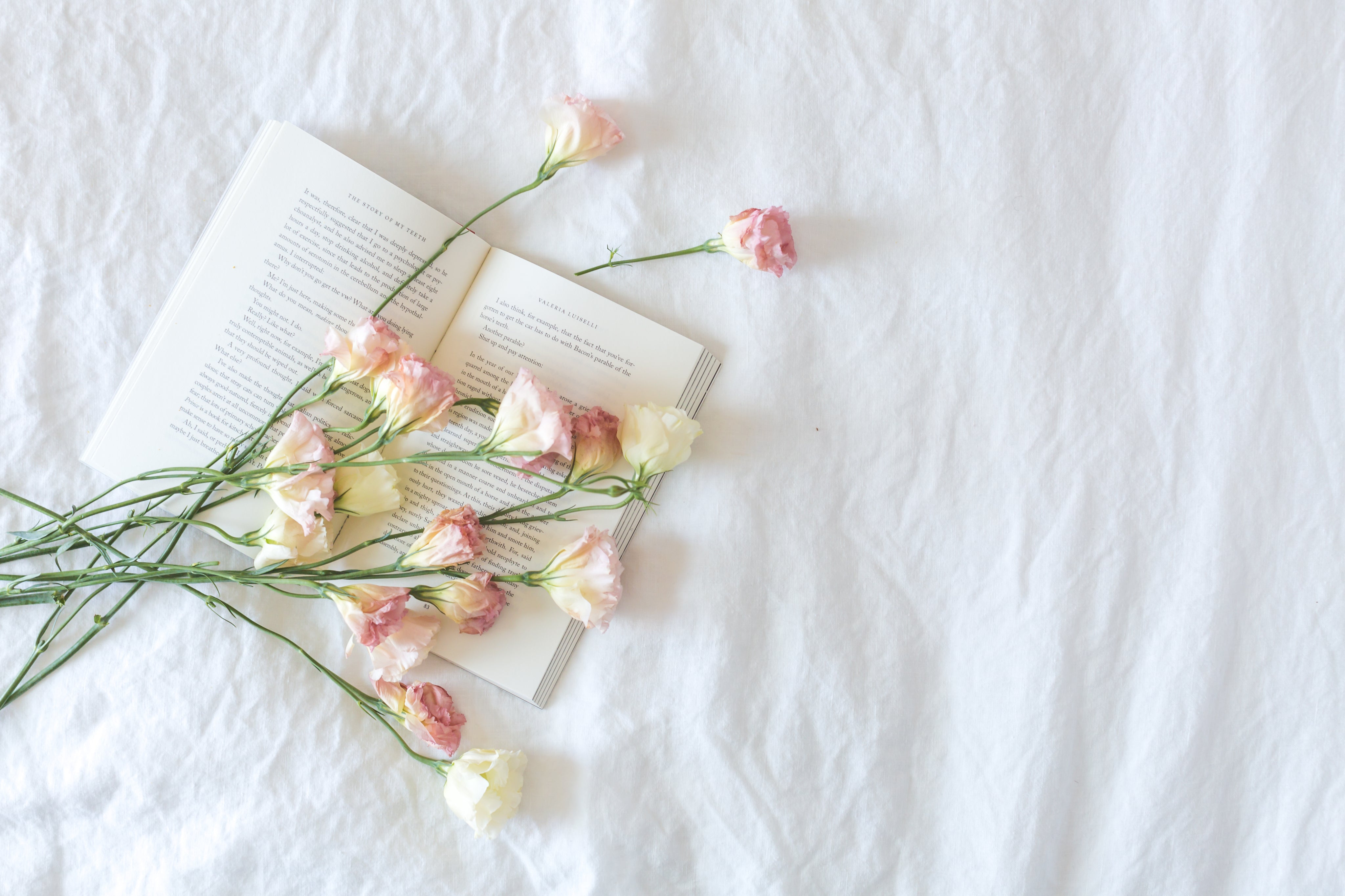 bed-with-book-and-flowers.jpg